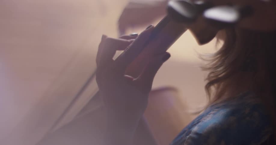 A woman plays the cello