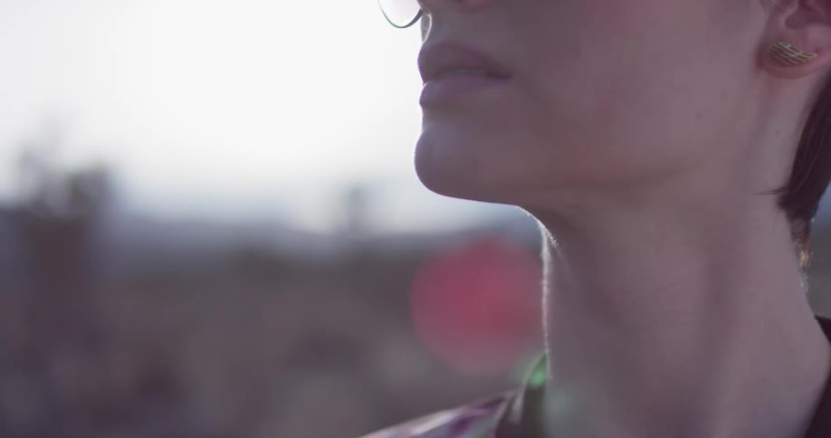 A woman is looking to her side
