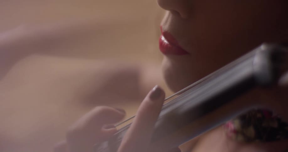 A woman plays the cello
