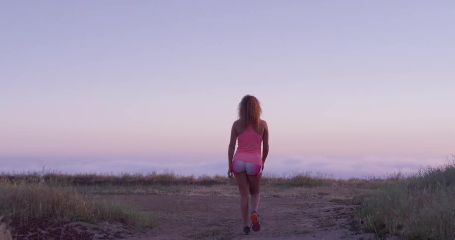 Woman Running In Nature