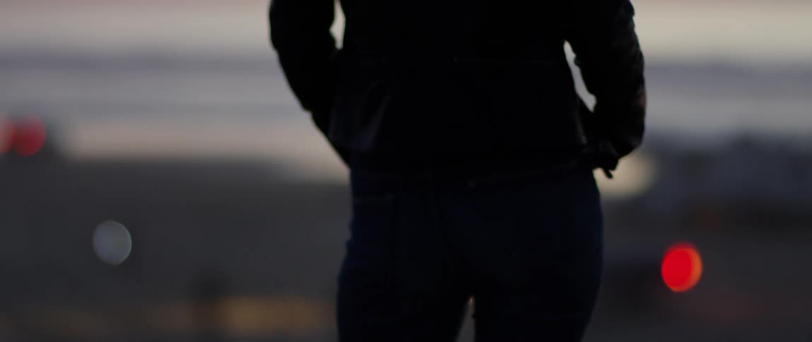 Woman Watching Sunset At Beach