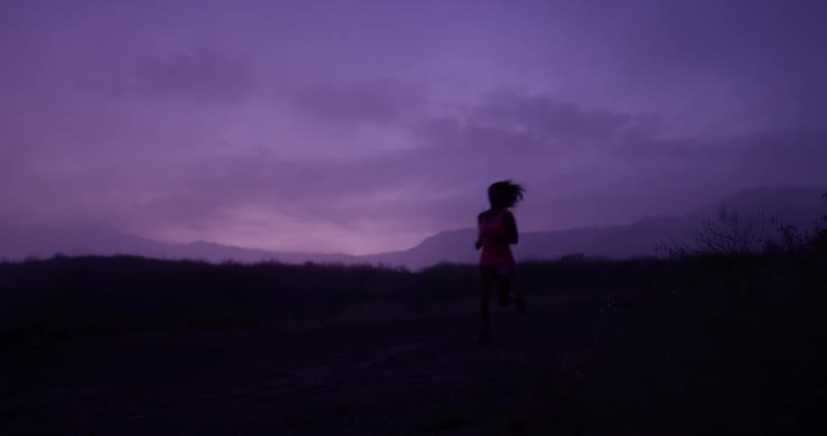 A woman jogs outside