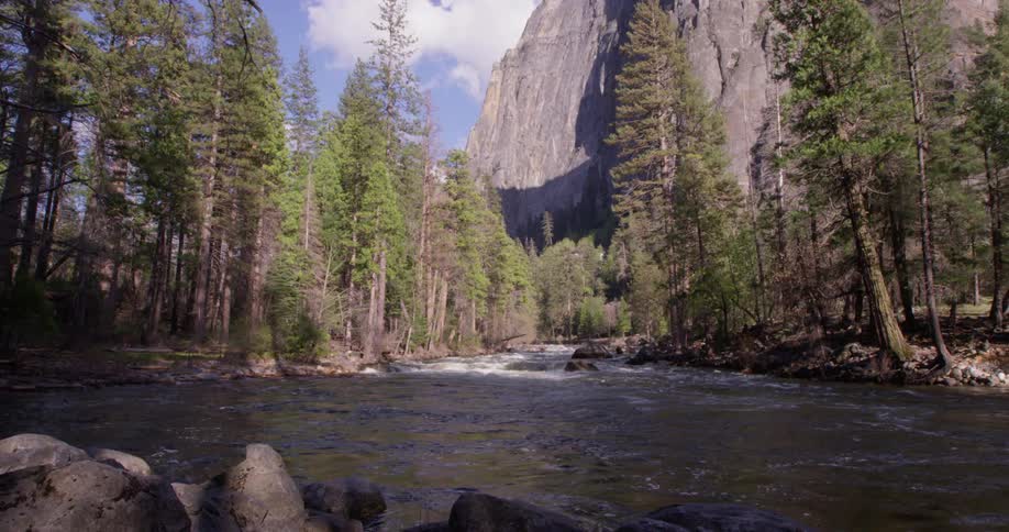 Water flows in the stream near the mountains
