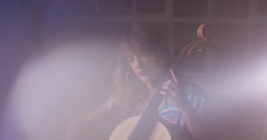 A woman plays the cello