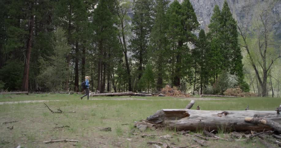 A person is hiking in the wilderness