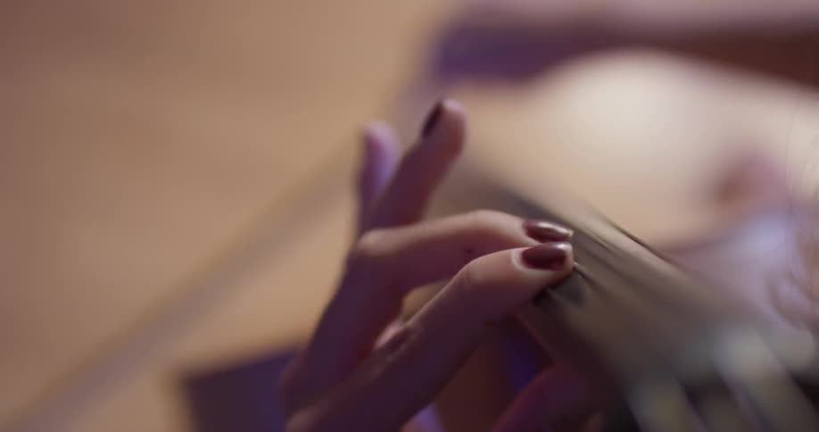 A woman plays a cello