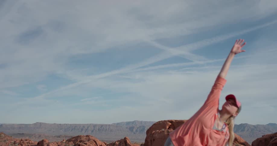 Woman Exercising In The Desert