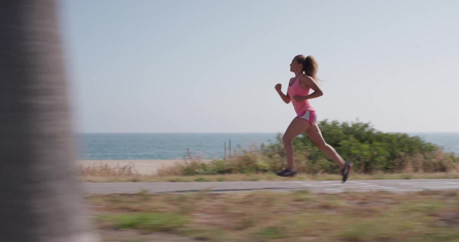 Woman Running In Nature