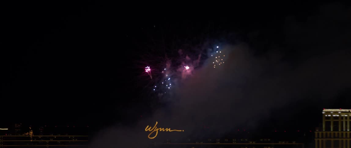 Fireworks explode above the wynn casino in las vegas