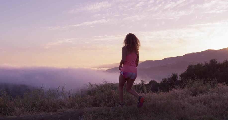 Woman Running In Nature