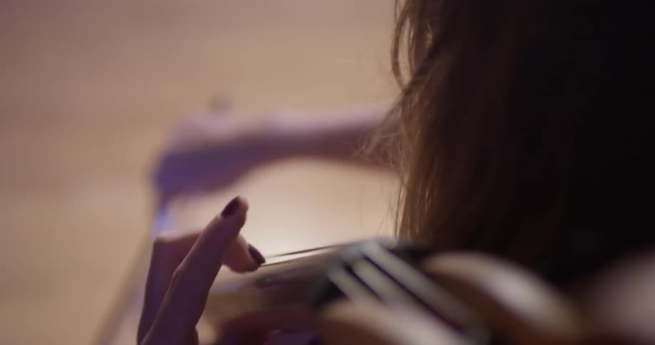 A woman plays a cello