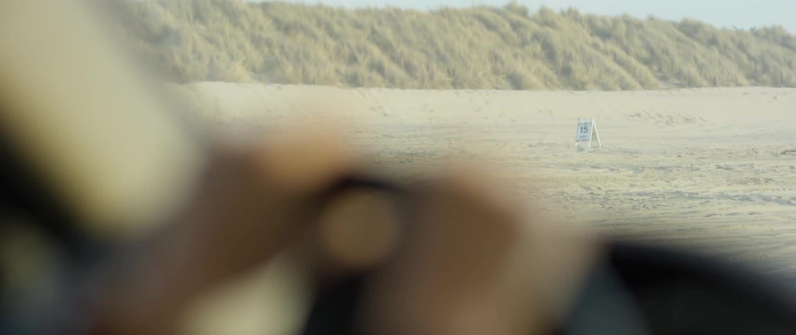 Woman Watching Sunset At Beach