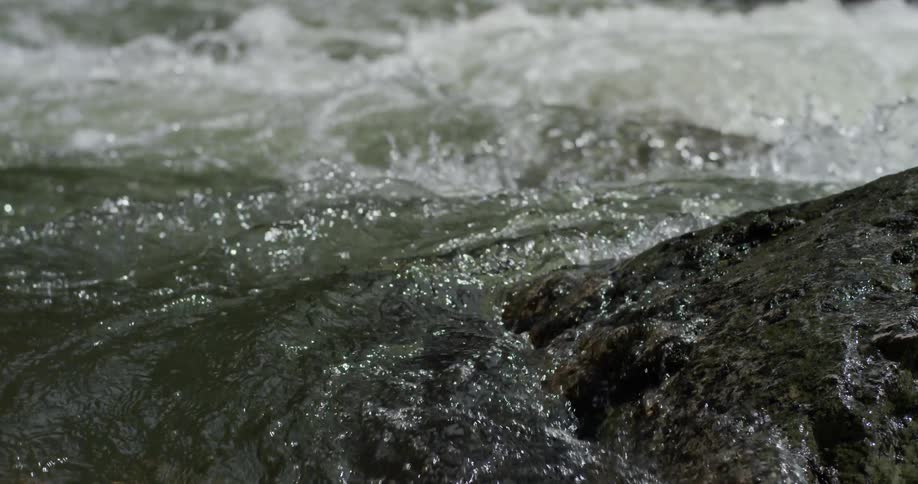 A river flows over rocks