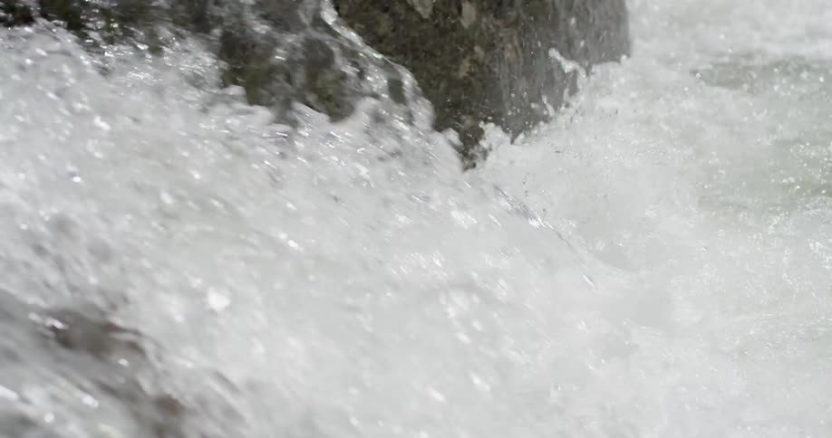 The water pours down over the rocks