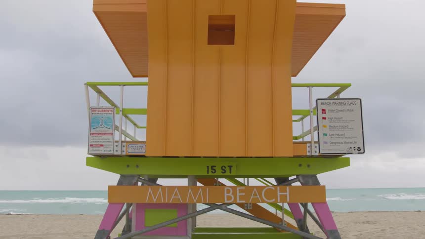 The lifeguard stand is orange