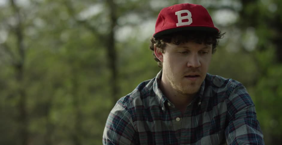 A man talks by the forest