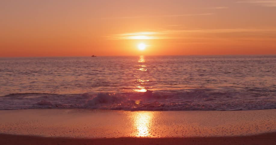 Woman Watching Sunset At Beach