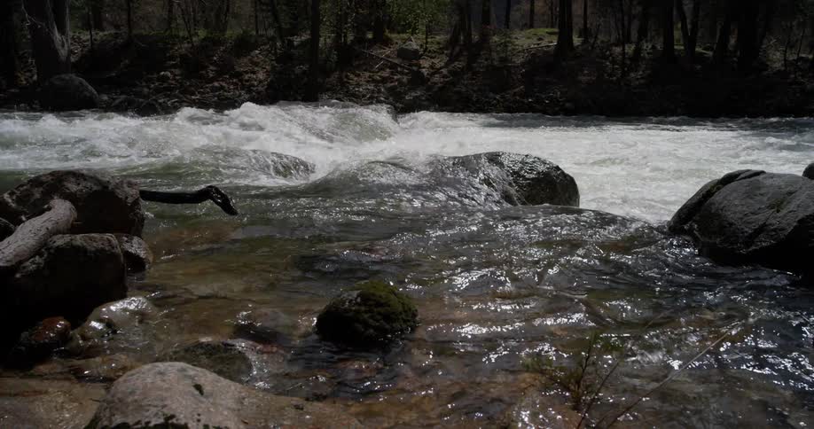 Water flows over the rocks in the creek