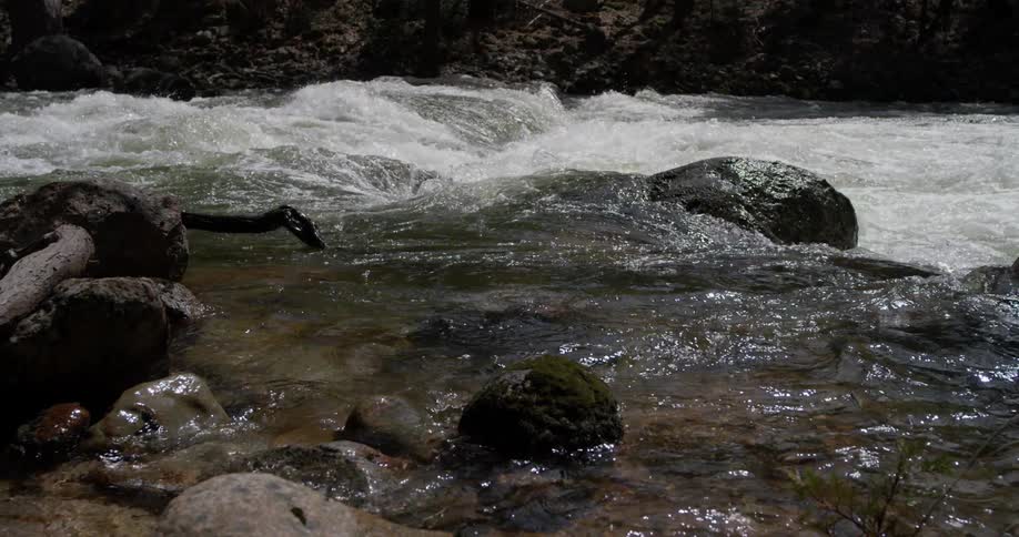 The water is crashing off the rocks