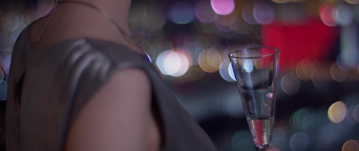 A woman is enjoying a drink