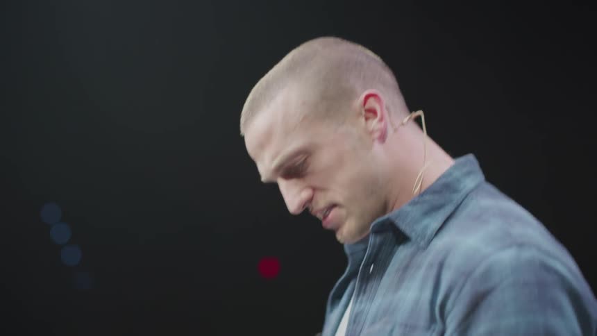 A man is working on the stage