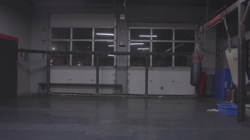 Boxers Practicing In Boxing Gym