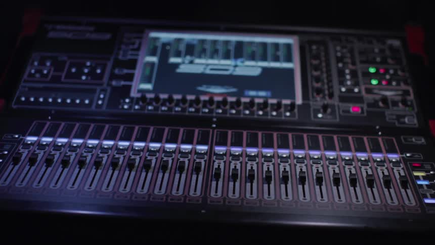 The equipment of a theater control room