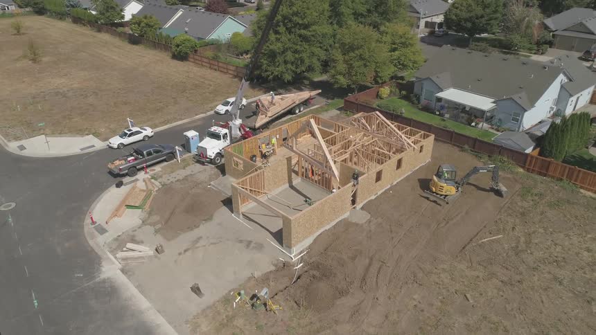 Construction site of house being built in neighborhood