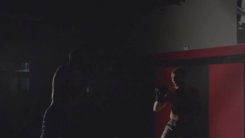Boxers Practicing In Boxing Gym