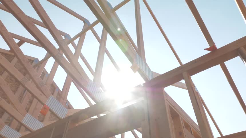 The sun shines on the wood frame