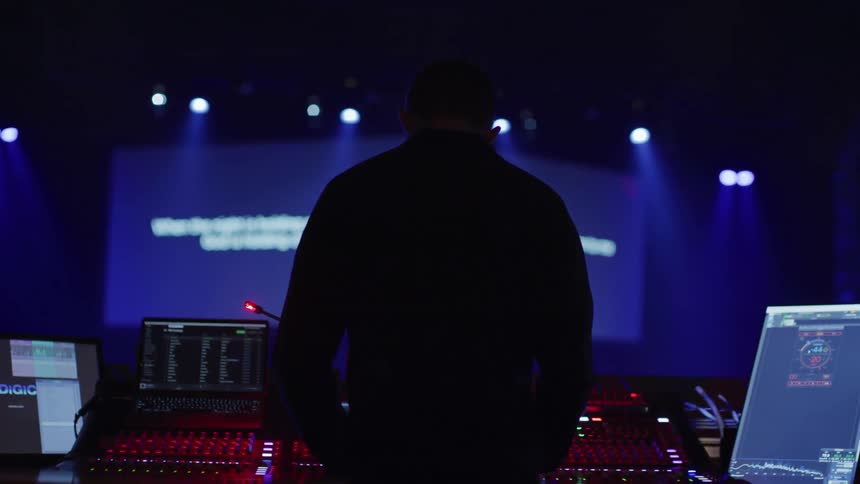A person is working on the stage