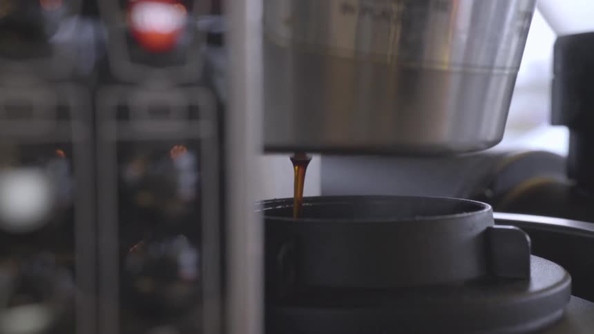 The machine is brewing coffee