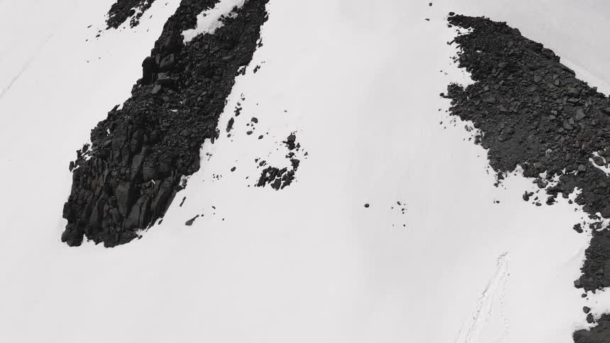 The mountain is covered with snow