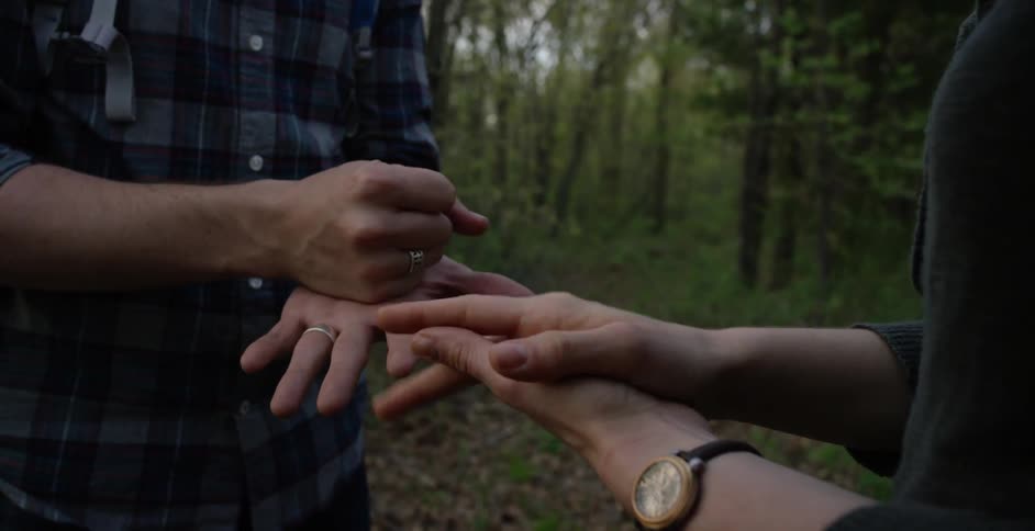 Two people play rock, paper, scissors