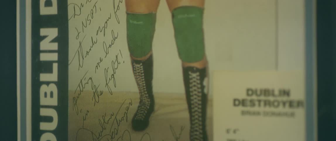 An autographed poster of an athlete