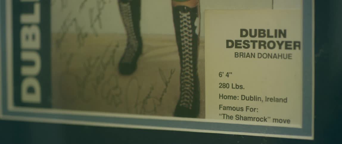 An autographed poster of a famous man