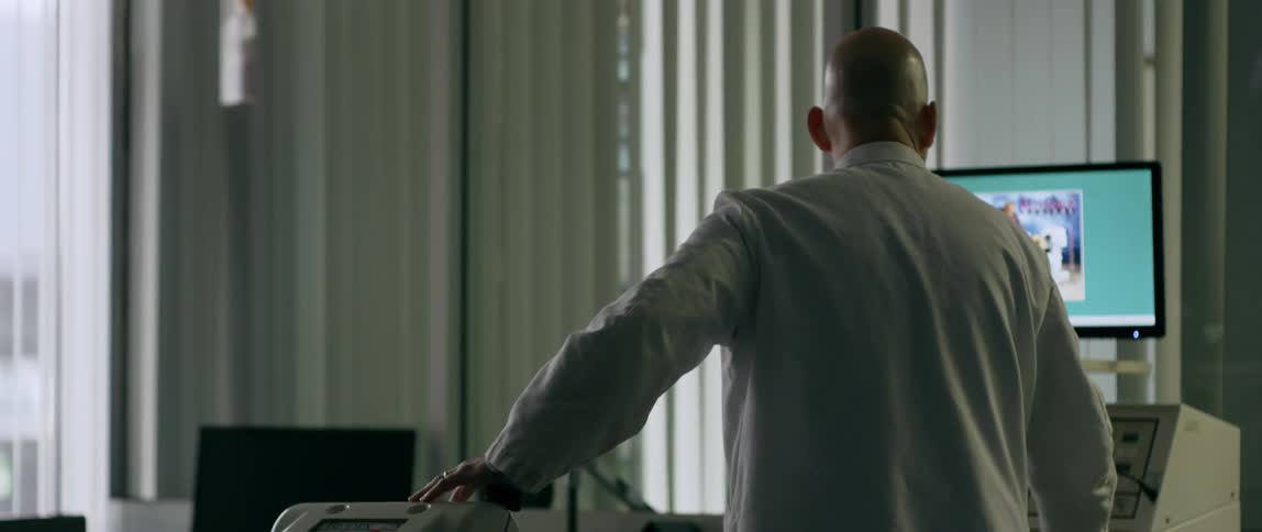A doctor watches the monitor in the office
