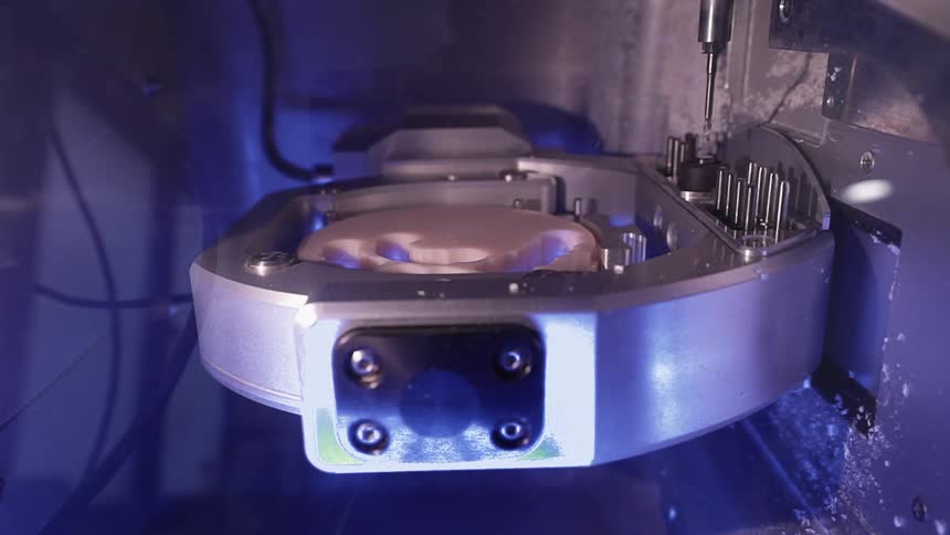 Metal machine moves forward creating shavings
