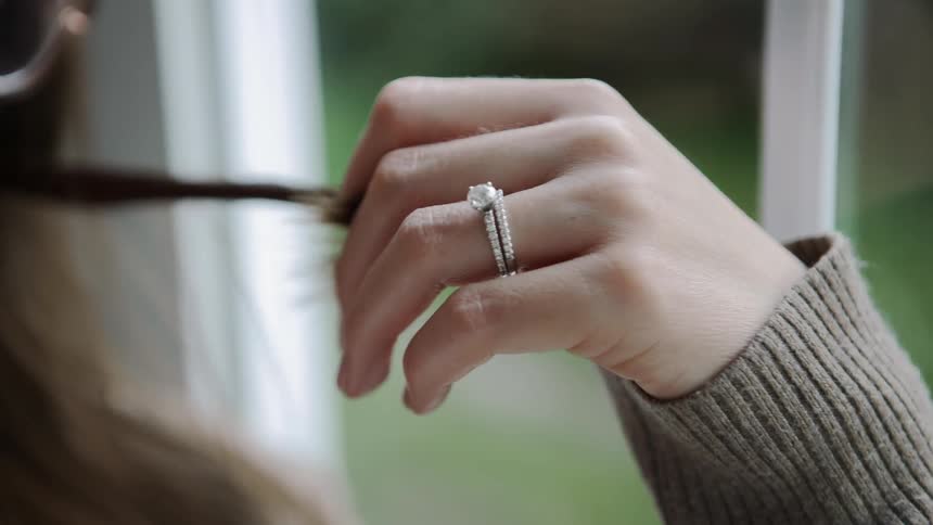 Close Up Of Woman Playing With End Of Her Hair