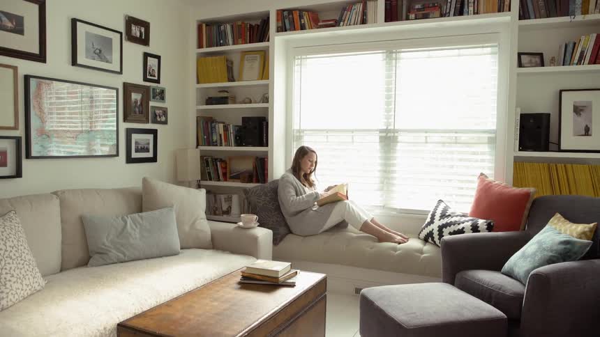 Woman Opens Her Book to Read