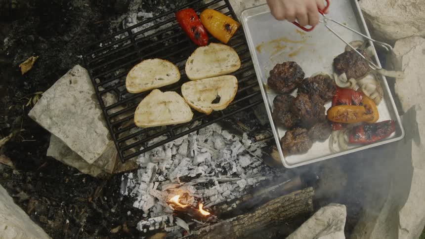 Man Cooking On The Grill