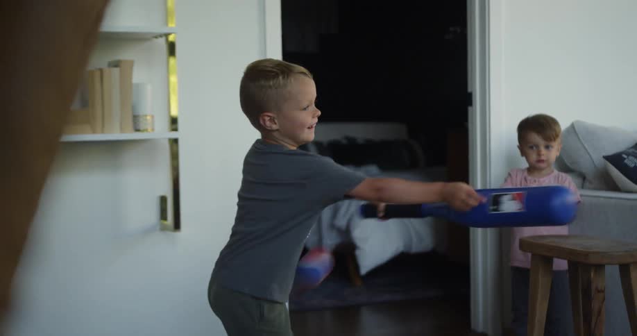 Young Family At Home Playing