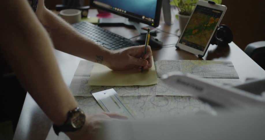 A man works at an office desk