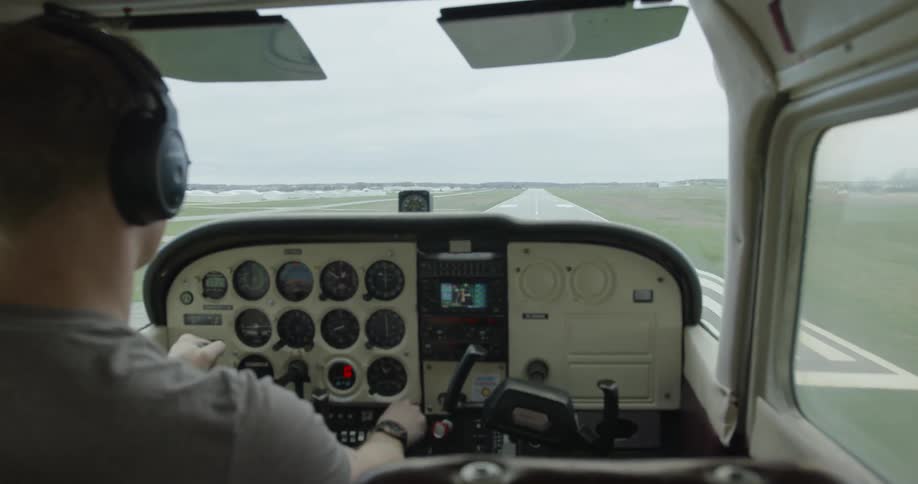 A pilot lands a small aircraft