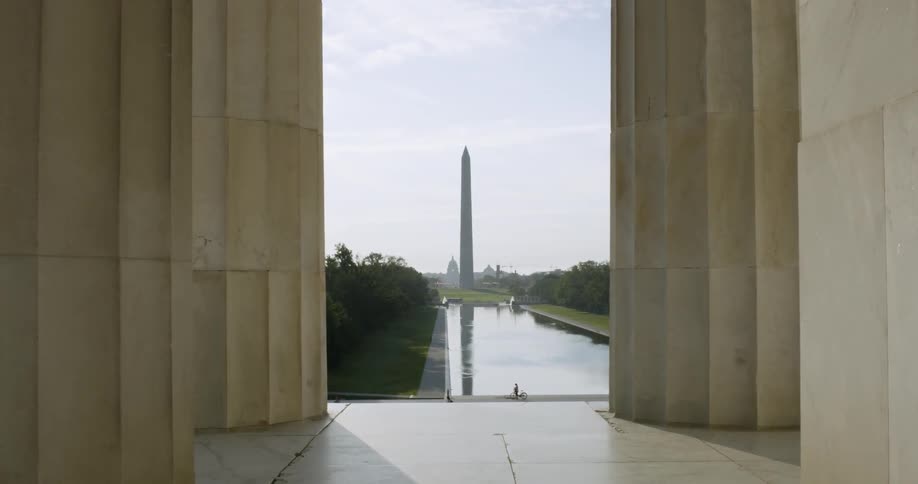 The Washington Monument Seen between Pillars and over the Reflecting Pool