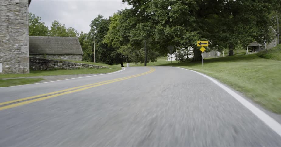 A car drives in the countryside