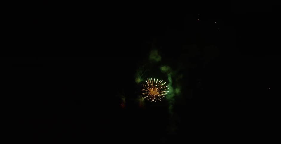 A dark sky with fireworks going off