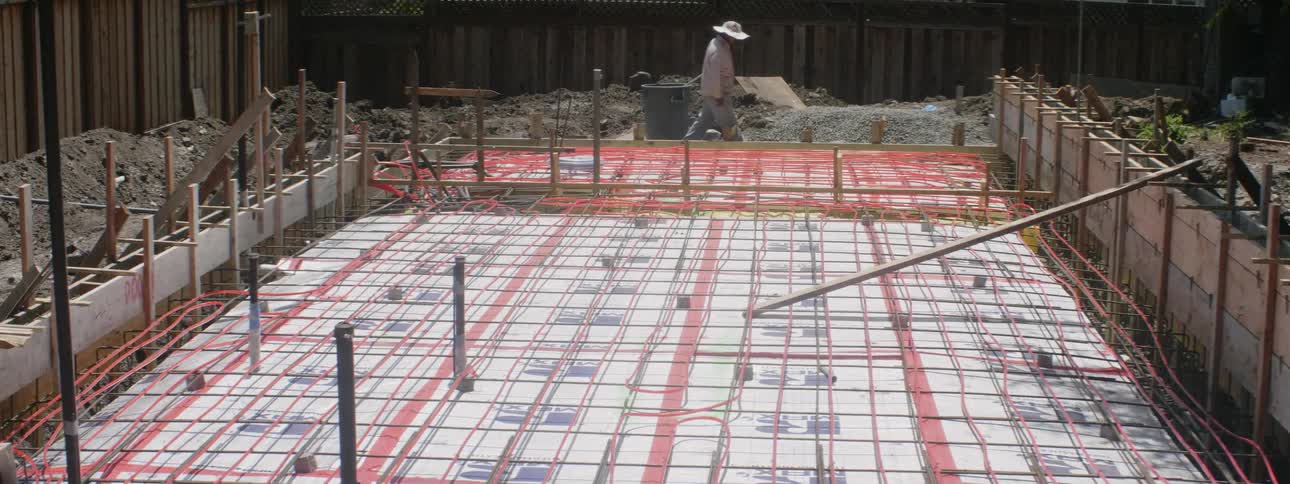 A man works at a construction site