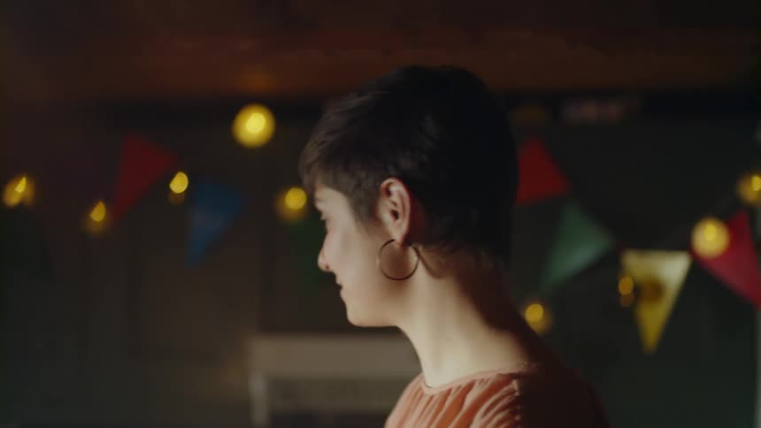 A woman is talking with people