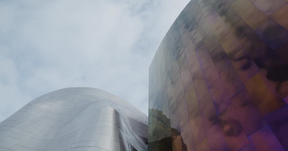 The building has tall reflective walls